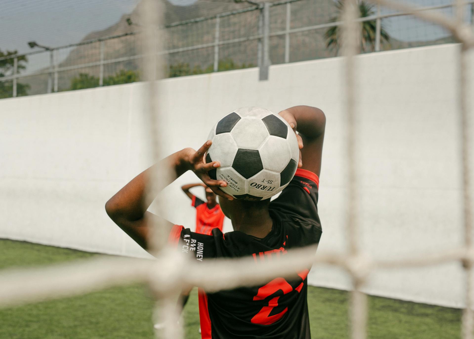 5 Practical Ways to Keep Soccer Balls in Your Backyard (And Keep the Neighbors Happy) | Photo by RF._.studio